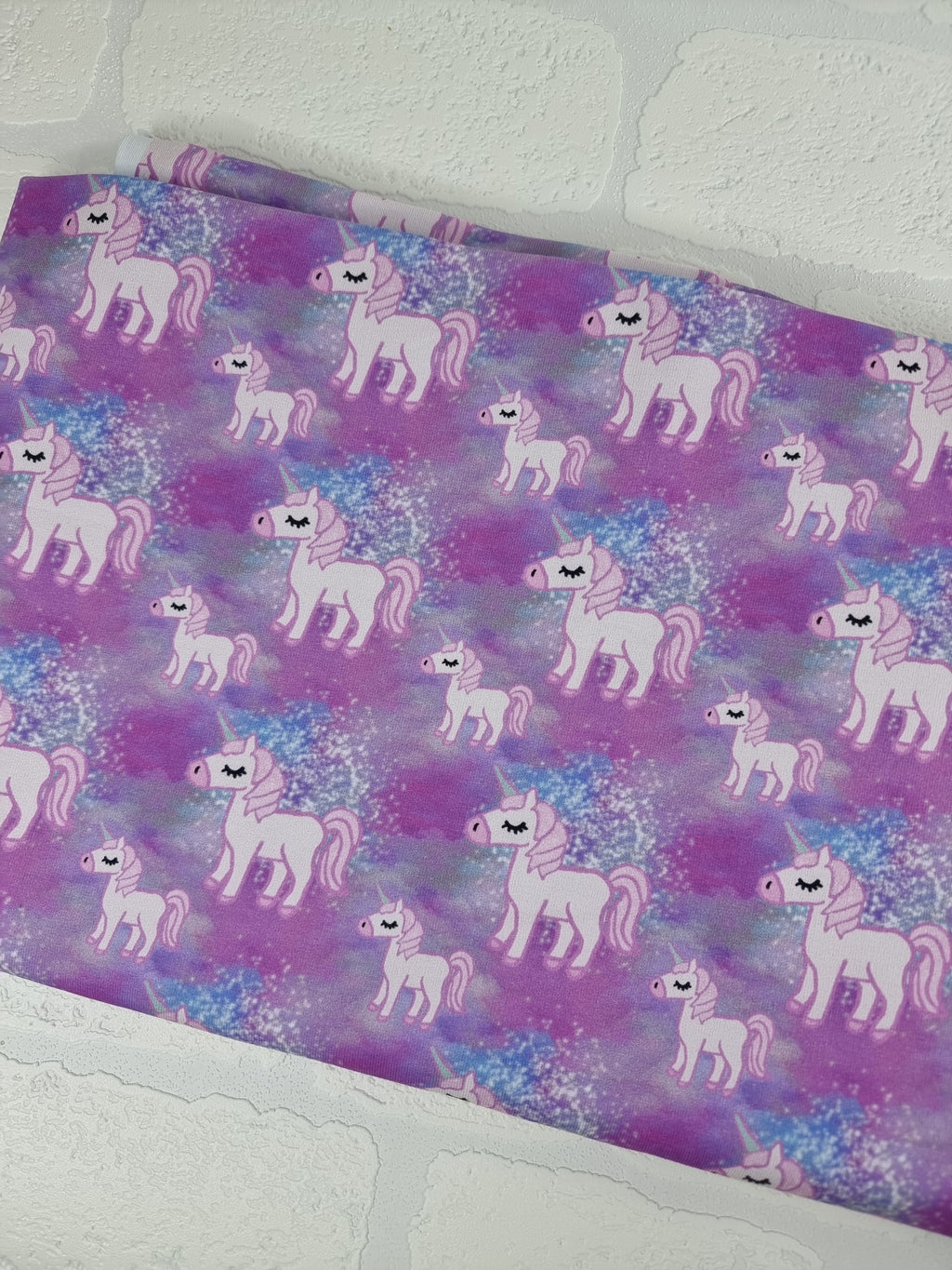 Exclusive pink unicorns french terry fabric for sale