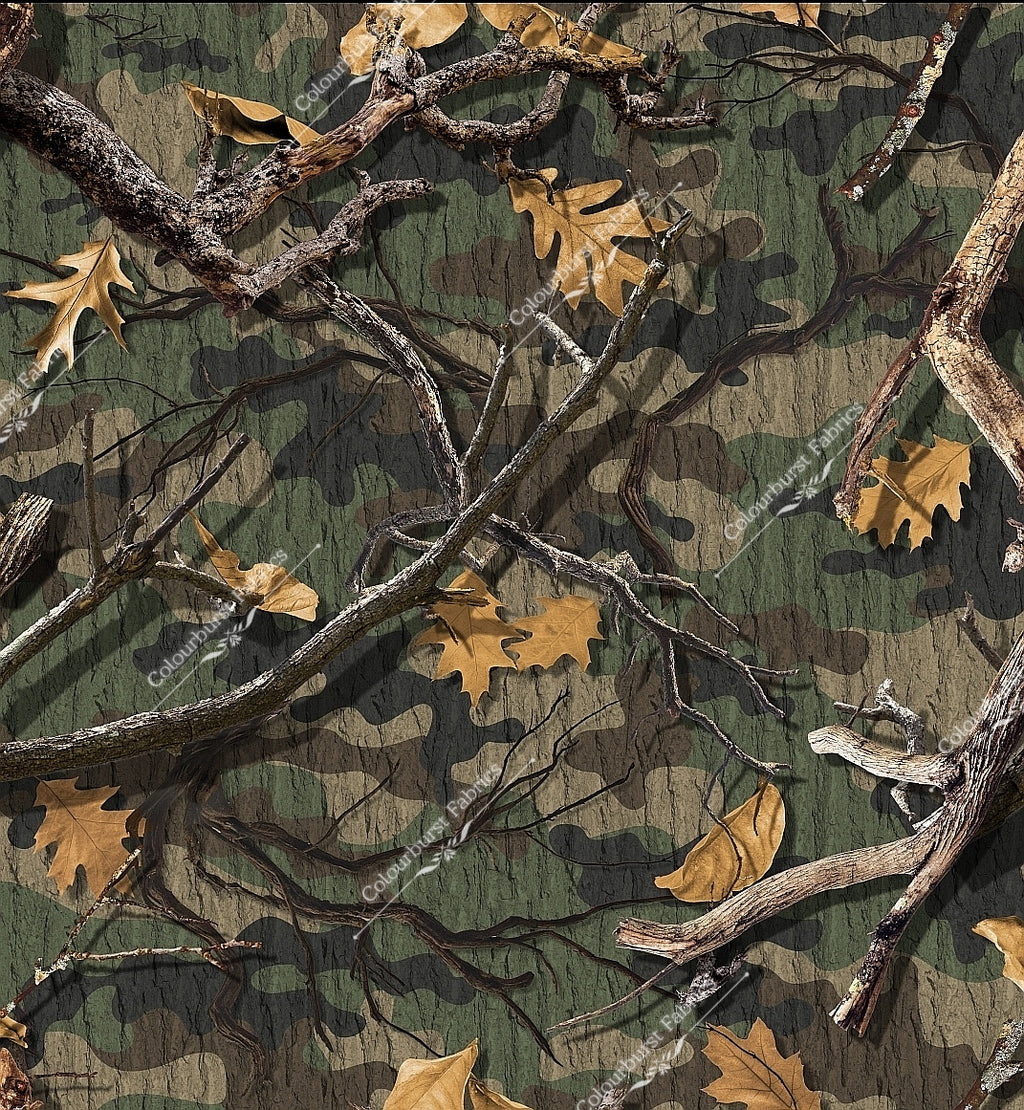 Camouflage woodland design with tree branches and autumn leaves. Seamless design for custom fabric printing onto our 22 bases