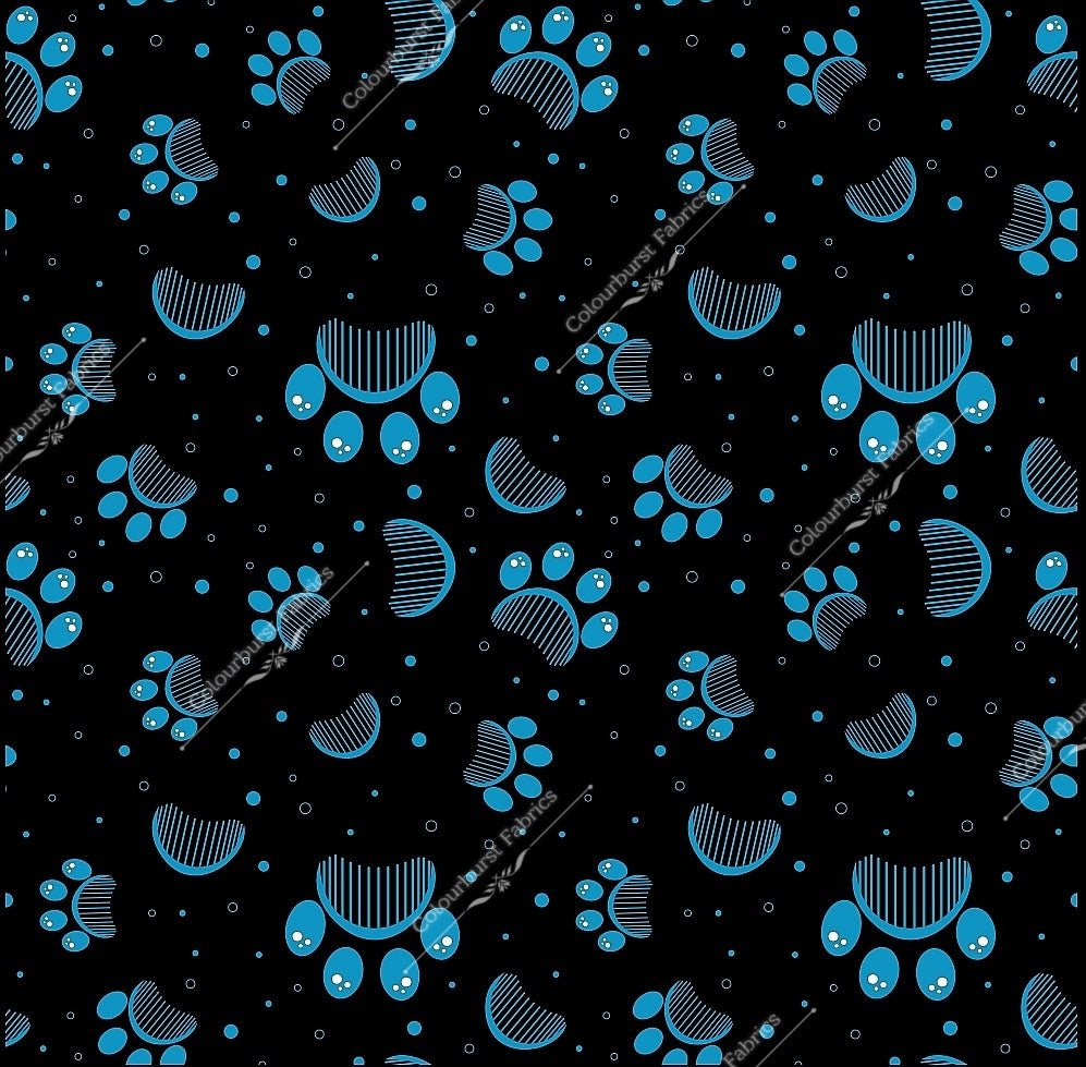 Teal blue dog paw prints on a black background. Seamless design for custom fabric printing onto our 22 bases