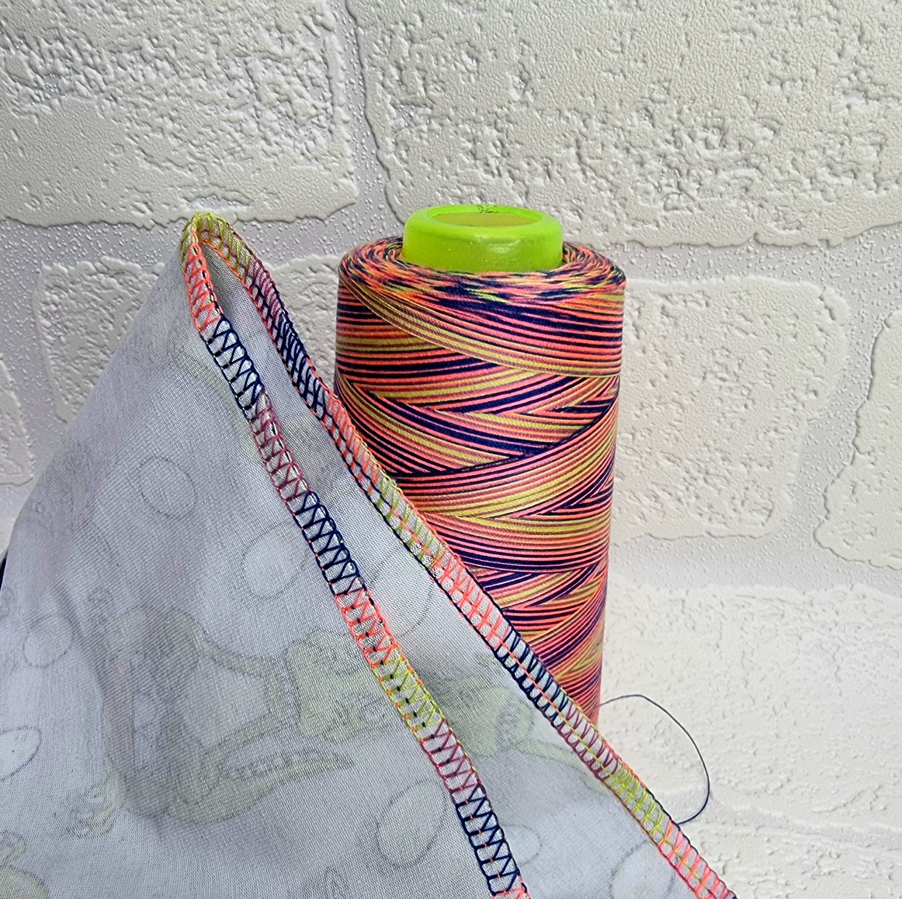 Rainbow thread spools, beautiful shades of the rainbow on the one thread. 3000 yards per cone, suitable for all sewing.