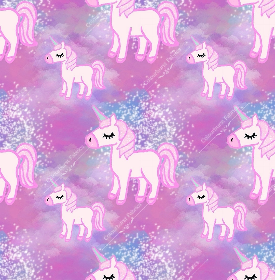 Pink unicorns on an ombre pink and white background. Seamless design for custom fabric printing onto our 22 bases